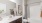 a bathroom with a tub toilet and sink